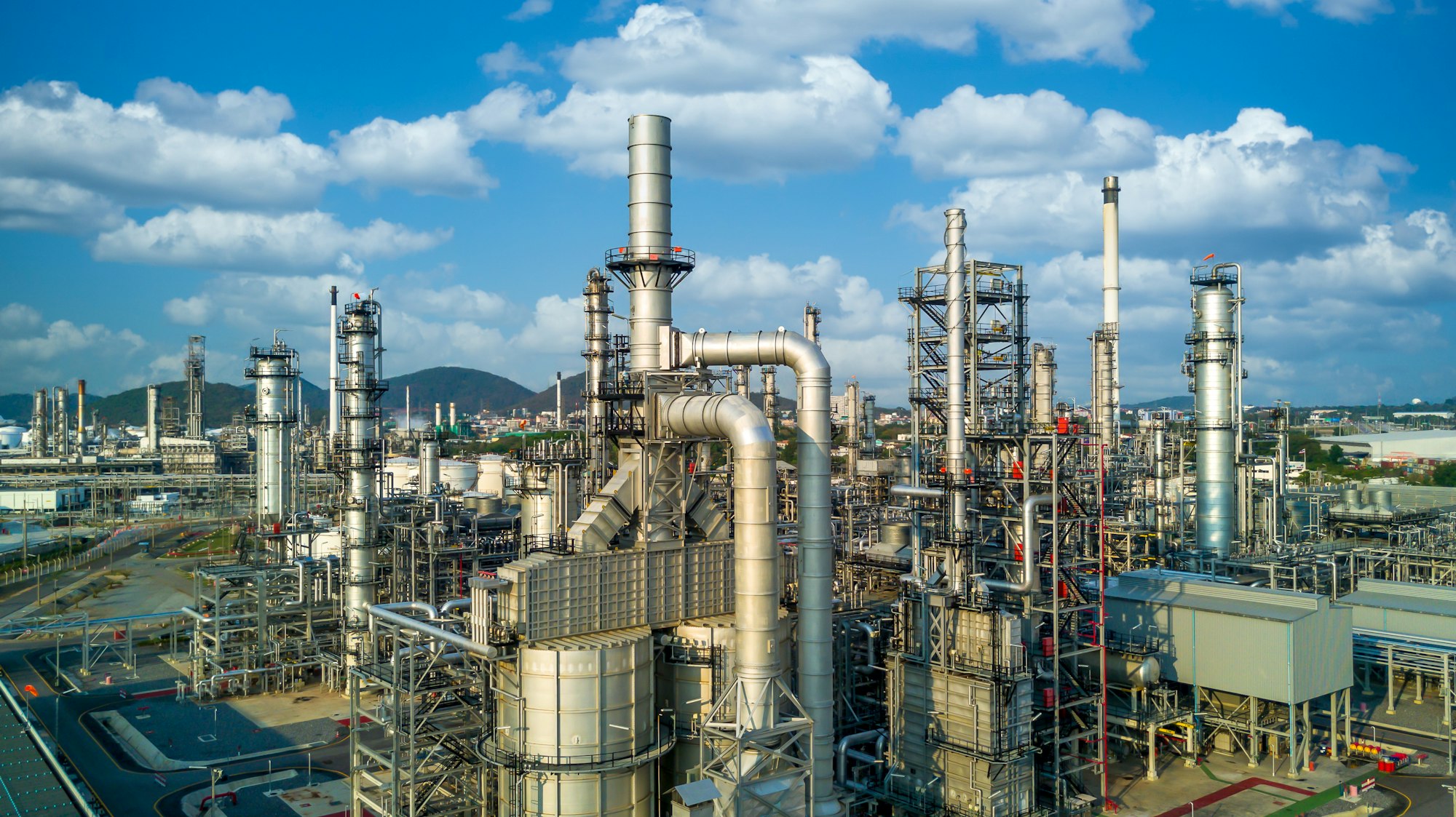 Aerial view oil refinery plant from industry zone, Oil and gas petrochemical industrial.